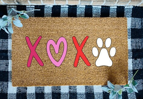Felpudo para el día de San Valentín con pata de perro XOXO
