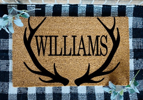Alfombra de puerta personalizada con apellido