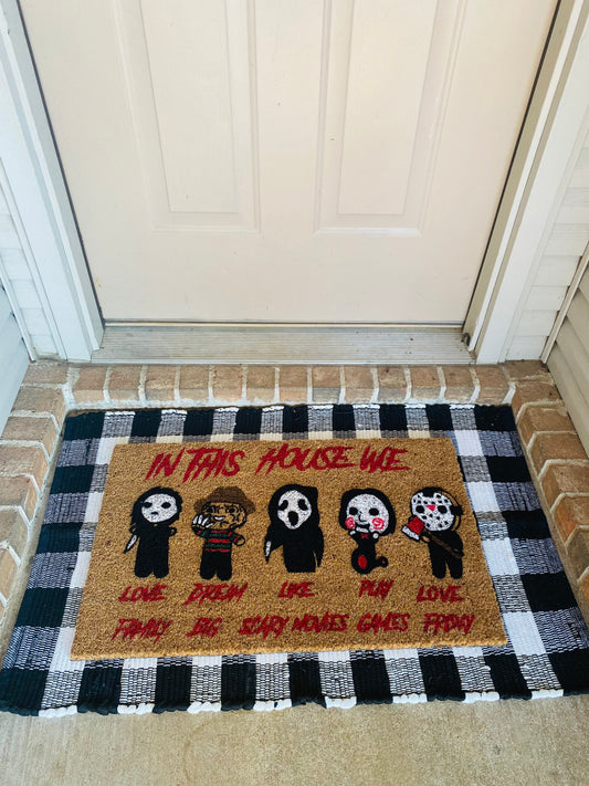 In This House We Love Family Dream Big Like Scary Movies Play Games Love Friday Door Mat in Color