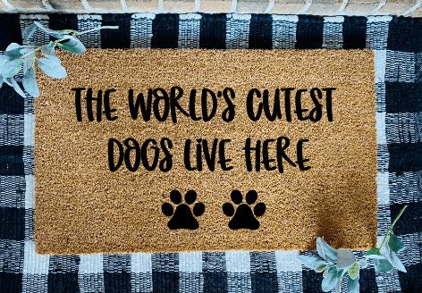 The World's Cutest Dog(s) Live Here Paws Door Mat