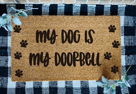 The Dogs Are Our Doorbell Welcome Rug